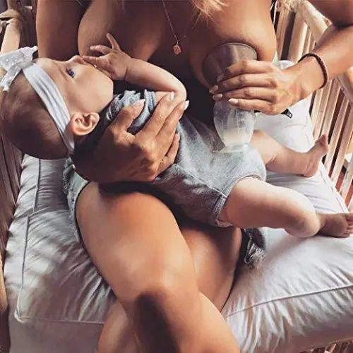 Haakaa Breast Pump And Cap Lifestyle Haakaa Breast Pump And Cap Lifestyle