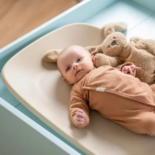 Nattou Changing Pad Softy Beige On Chnage Table With Baby Nattou Changing Pad Softy Beige On Chnage Table With Baby