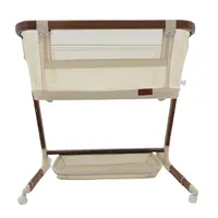 Babystudio Dream Glider Wood Grain Bassinet Front View