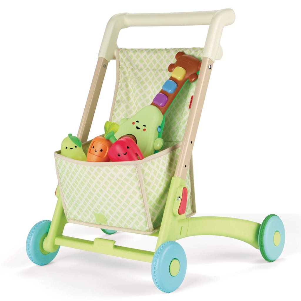 Skip Hop Farmstand walker in shopping cart mode with a fabric basket