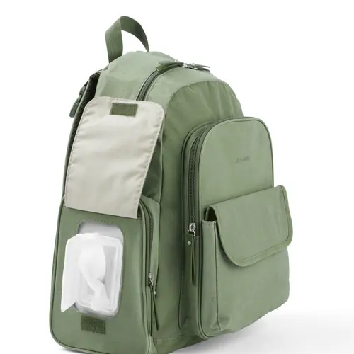 Skip Hop Luna Nappy Backpack Sage Wipes Pocket Detail Side view of the Skip Hop Luna Sage backpack with the wipes pocket open
